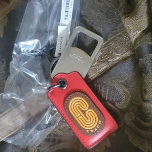 Coach bottle opener great Keychain or clip to bag unisex red leather